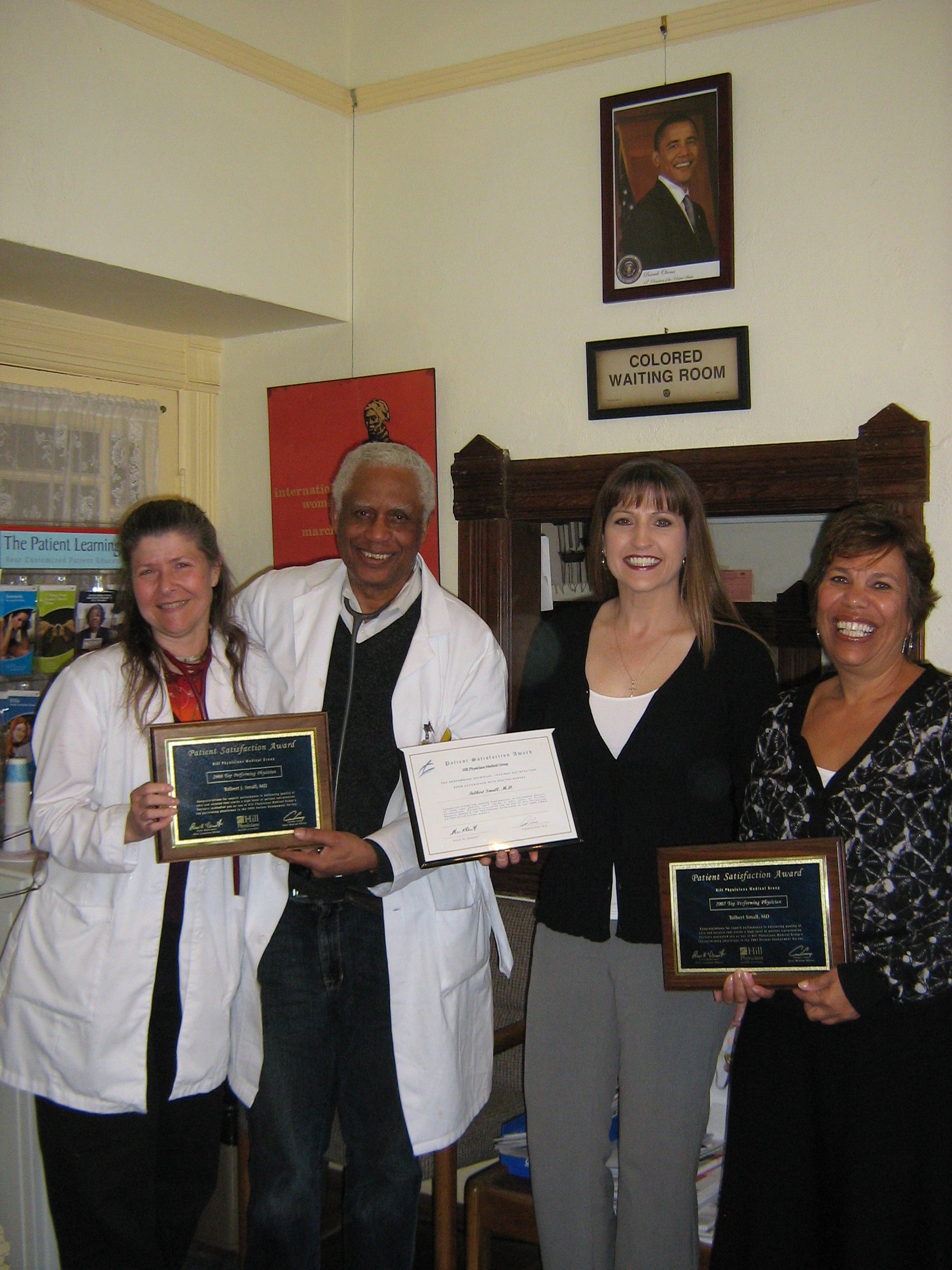 Bert and Anola Small + Staff receive a Patient Satisfaction award from Hill Health