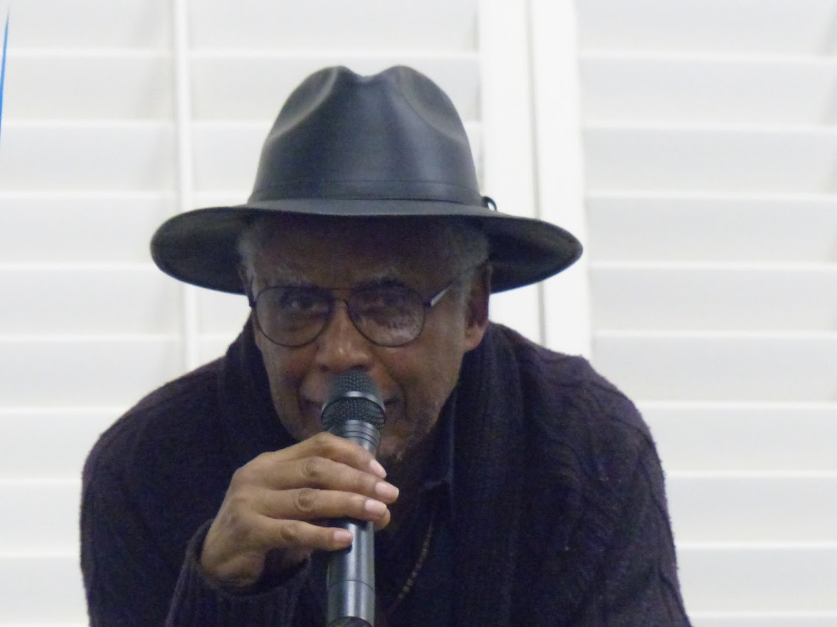 Dr. Small at a poetry reading